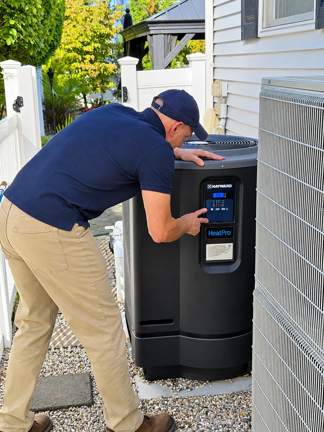 Robert checking outdoor mechanical equipment at a North Jersey property